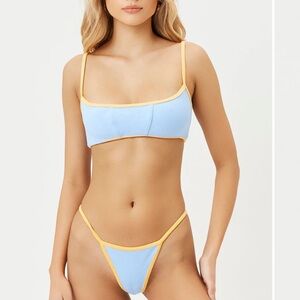 Frankie’s bikinis harmony terry bikini top in color bluebird size medium